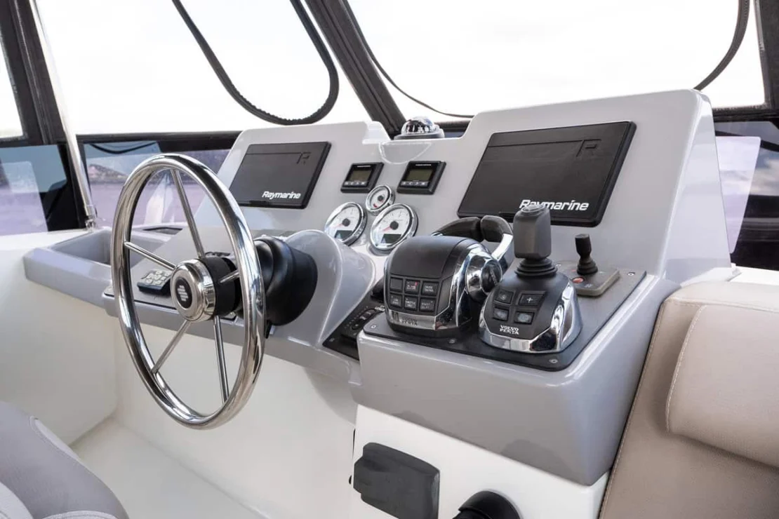 Beneteau Oceanis Swift Trawler 50 flybridge helm detail.