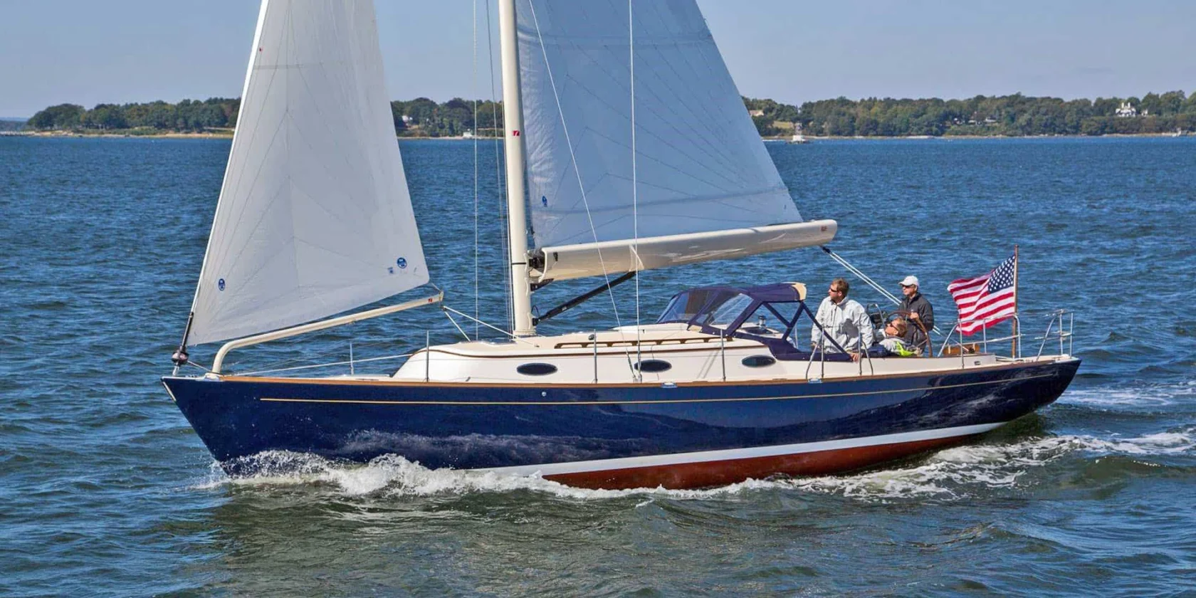 Alerion Yacht sailing on the ocean.